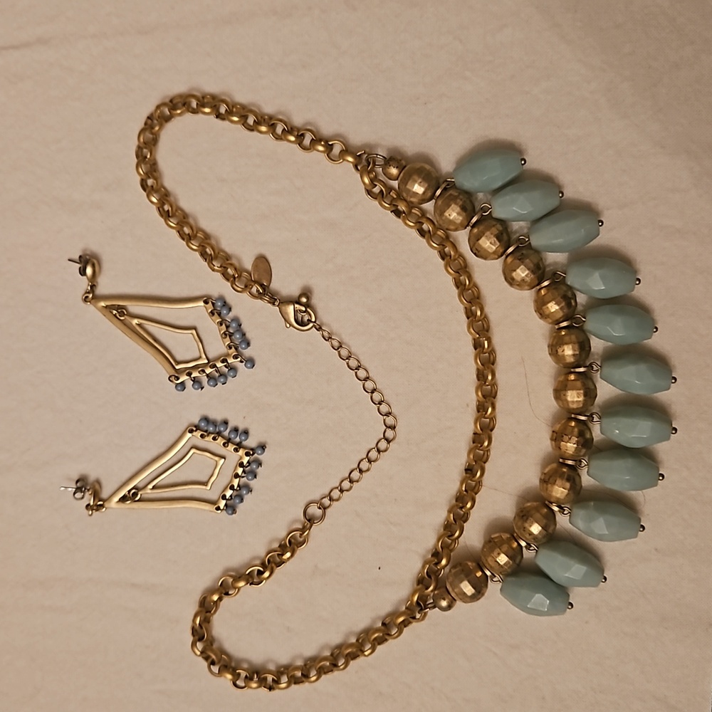 Lia Sophia necklace and earrings set. Blue and brushed gold